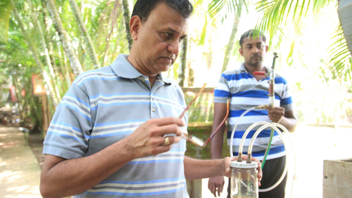 A man holding a device