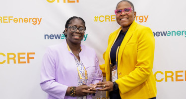 L-R: Ms Niebert Blair, Advisor, NDC-TEC, and Professor Tannecia Stephenson, UWI Mona Campus, Jamaica receive Best E-mobility Programme Award at the 7th Annual Caribbean Renewable Energy Forum (CREF) in Miami in May 2025. 